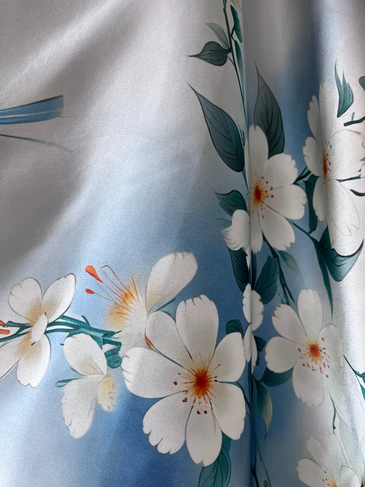 Blue silk scarf for women 90x90 cm with white floral and butterfly print, luxury square silk scarf in soft blue tones, romantic and elegant accessory for neck, hair or handbag, perfect gift, Mėlyna šilkinė skarelė moterims 90x90 cm su baltais žiedais ir drugeliais, prabangi kvadrato formos šilko skarelė švelnių mėlynų atspalvių, romantiškas ir elegantiškas aksesuaras kaklui, plaukams ar rankinei, subtili dovanos idėja moteriai.