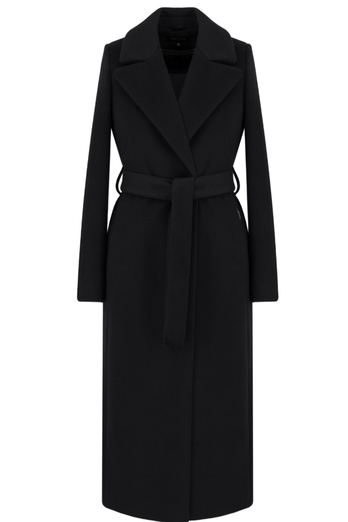 Black wool coat Amber for women – long classic winter coat with lapel collar, belt at the waist, side pockets and back vent. Elegant timeless design, insulated and lined, ideal for cold weather. Model is wearing size 34. Juodas vilnonis paltas Amber – klasikinis ilgas paltas su diržu, šoninėmis kišenėmis ir skeltuku nugaroje.