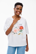 balti moteriški marškinėliai su spalvota gėlių aplikacija medvilniniai laisvo silueto marškinėliai moterims pavasariui ir vasarai