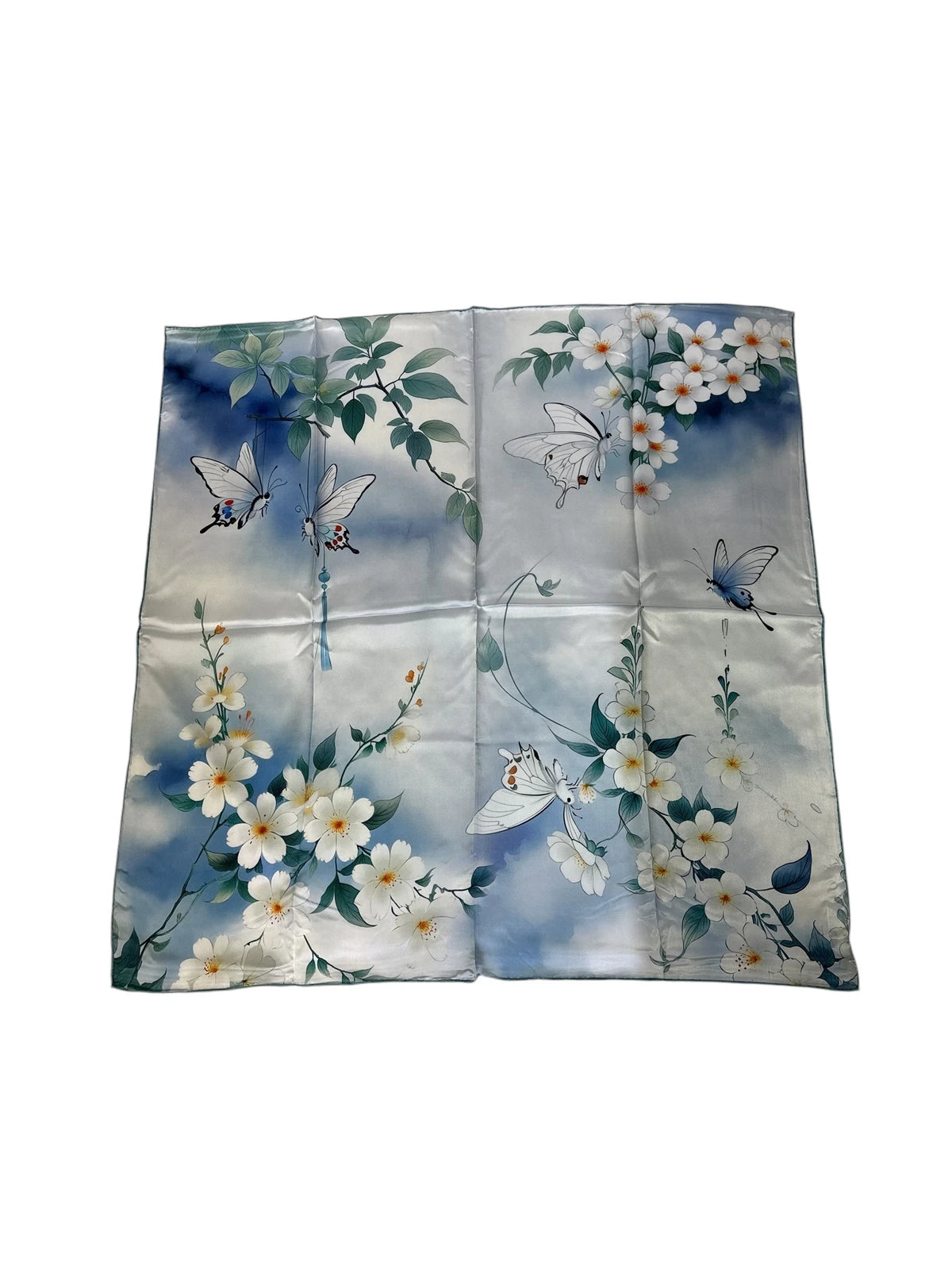 Blue silk scarf for women 90x90 cm with white floral and butterfly print, luxury square silk scarf in soft blue tones, romantic and elegant accessory for neck, hair or handbag, perfect gift, Mėlyna šilkinė skarelė moterims 90x90 cm su baltais žiedais ir drugeliais, prabangi kvadrato formos šilko skarelė švelnių mėlynų atspalvių, romantiškas ir elegantiškas aksesuaras kaklui, plaukams ar rankinei, subtili dovanos idėja moteriai.